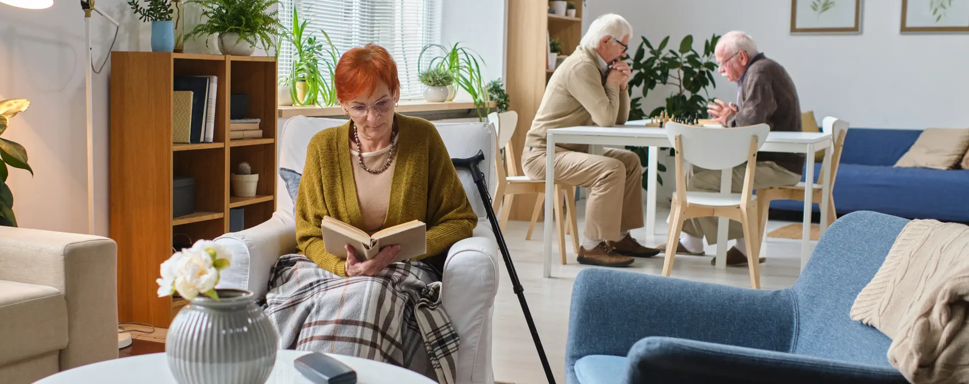 elderly woman reading book