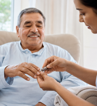 caregiver helping an elderly man