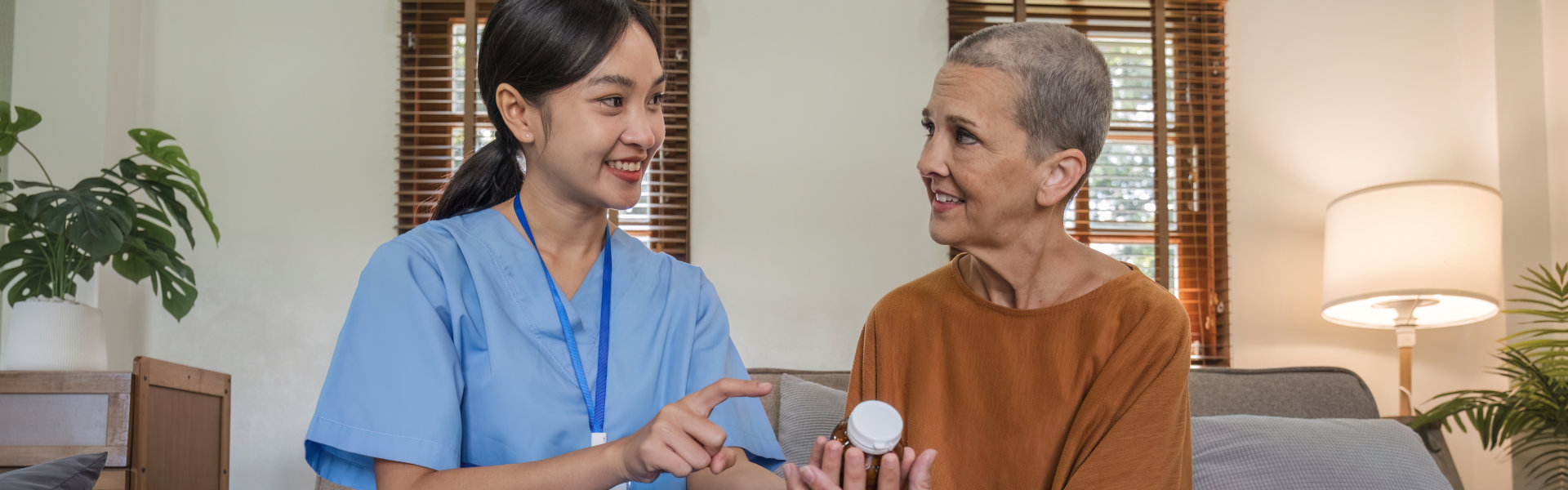 caregiver giving medication