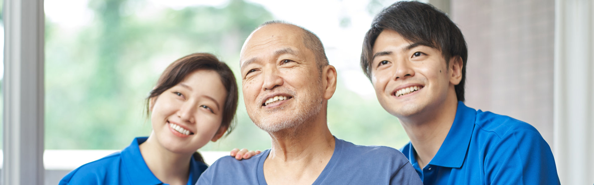 three person smiling together